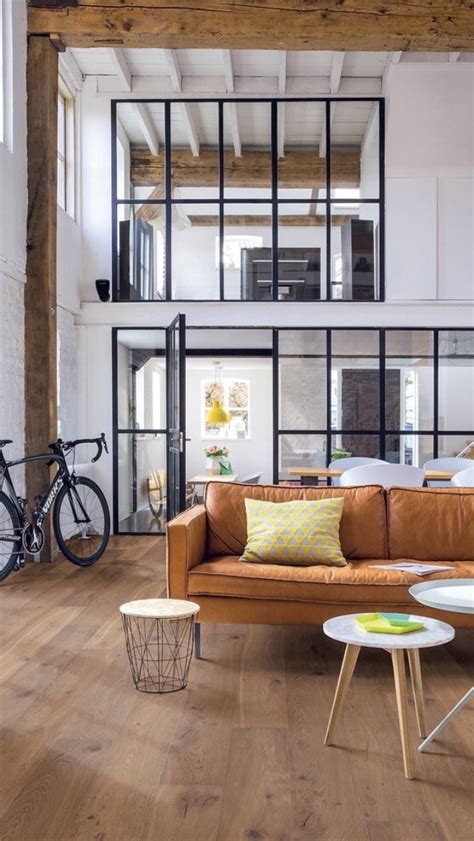 The soft industrial style involves toning down the harshness of the modern industrial look to create a warmer, more inviting space. Beautifully blends a soft industrial interior against ...