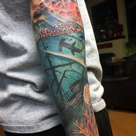 Blue lotus on water tattoo on biceps. 80 Water Tattoos For Men - Masculine Liquid Designs