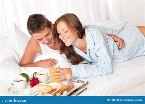 Happy Couple Having Breakfast In Bed Stock Photo Image Of Smiling