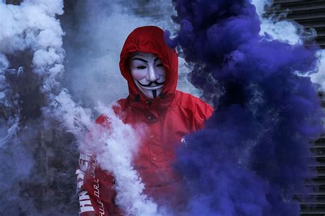 HD wallpaper: man wearing red jacket surrounded by purple and white smoke, person wearing Guy ...