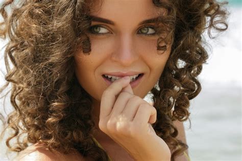 Premium Photo Beautiful Woman With Curly Hair