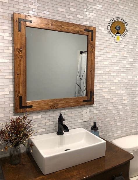 Wooden wall mirror dark wood frame natural sustainable wood 60 cm square hallway bathroom rustic simplicity handmade in somerset uk marcwoodjoinery from shop marcwoodjoinery. Handmade Mirror by Lulight Shop, Bathroom Mirror, Rustic ...