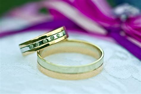 Two Gold Wedding Rings Of White And Yellow Gold Stock Photo Image Of