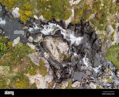 Drone Aerial View Landscape Of River Flowing Over Rocks And Down
