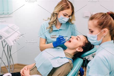 Young Female Dentist And Her Sponsored Dentistwomanyoungsmiling