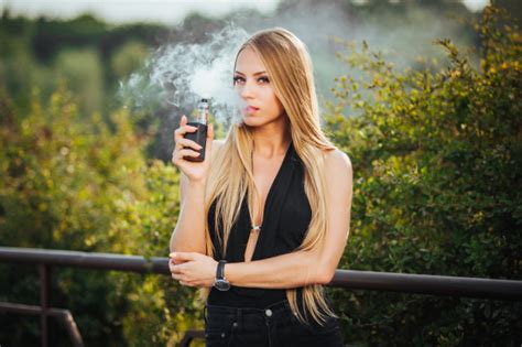 Vaping Young Beautiful Woman Smoking E Cigarette With