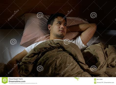 Depressed Man Suffering From Insomnia Stock Photo Image Of Lying