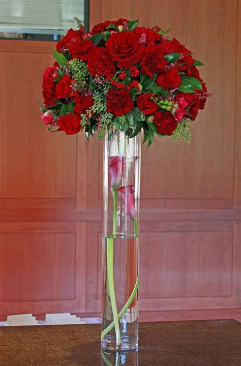 Plant in a sunny area. Tall red wedding centerpiece by Signature Bloom | click on ...