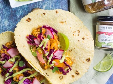 Scoop the flesh into the bowl of a food processor. Fish Tacos with Avocado Crema and Cabbage Slaw - Sutter ...