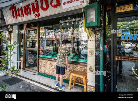 Bangkok, Thailand. 05th Apr, 2023. A young tourist looks through the