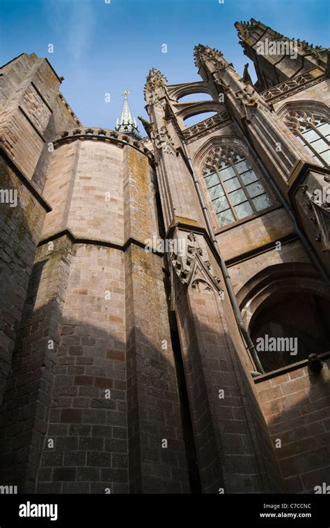 Gothic Towers Spires Arched Windows And Buttresses At Monastery Of
