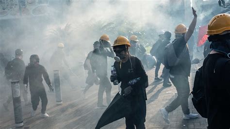 Hong Kong Strike Spreading Clashes Paralyze City The New York Times