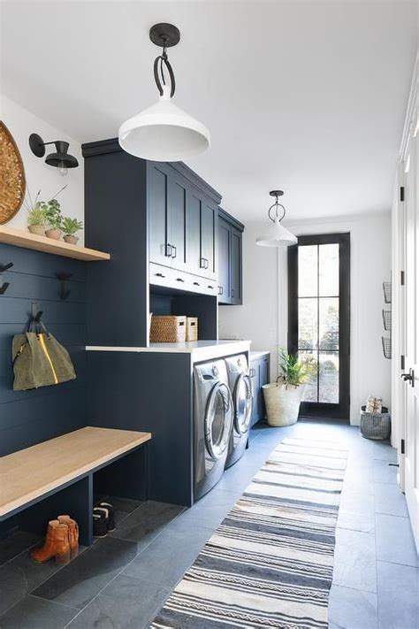 The homewyse laundry room cabinet cost estimates do not include costs for removing existing cabinets or moving/modifying walls, plumbing and electrical systems. This beautifully designed dark blue laundry room and ...