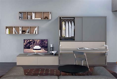 Letto a scomparsa singolo a soppalco con cabina armadio e completo di pratica scaletta e scrivania scorrevole per angolo studio. Parete attrezzata con armadio e letto a scomparsa Dynamic ...