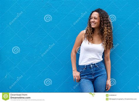 Portrait Of Young Woman With Curly Hair Smiling Stock Photo Image Of