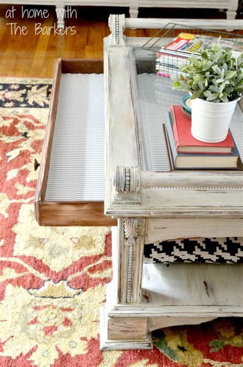 It needs to hold books, magazines, drinks, food — even games on game night. Coffee Table Makeover-At Home with The Barkers