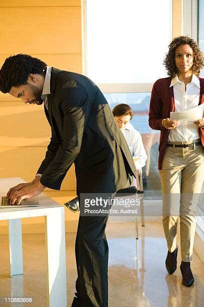 Bent Over Table Photos And Premium High Res Pictures Getty Images