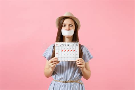 Portrait Of Woman Holding Female Periods Calendar For Checking