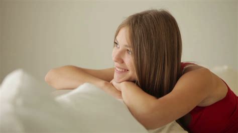 Relaxed Person Smiling On Couch Stock Footage Sbv Storyblocks