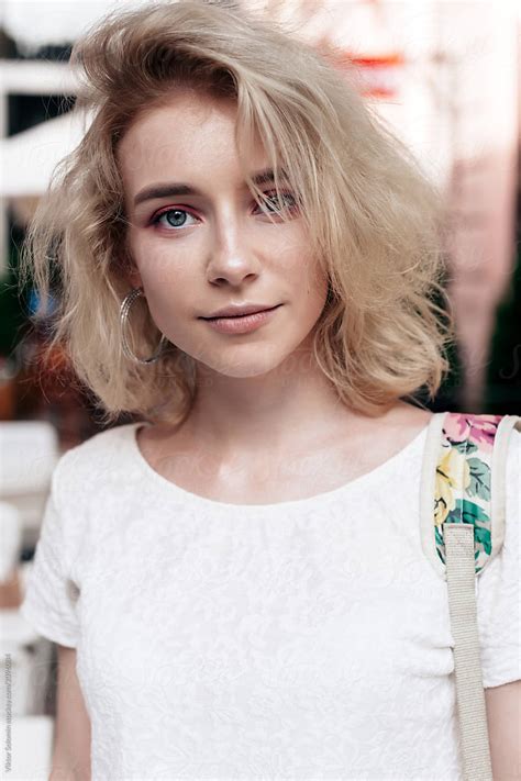 Summer Street Portrait Of Beautiful Blonde Girl By Stocksy Contributor Viktor Solomin Stocksy