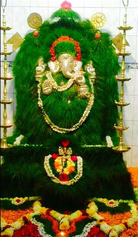Click on the picture for the recipe. Vinayagar decorated with Arugampul | Lord ganesha ...