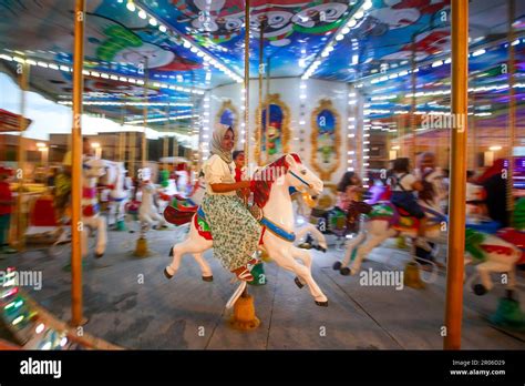An Iraqi Girl Smiles During A Ride In An Amusement Park In Hila Iraq