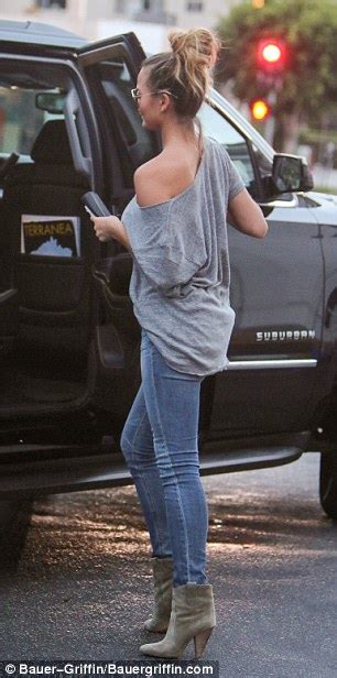 Chrissy Teigen Wears Slinky Top And Skinny Jeans In Beverly Hills Daily Mail Online