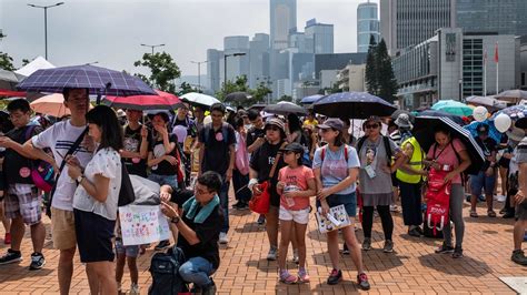 Hong Kong Protesters Defy Beijing Warnings As Police Fire Tear Gas