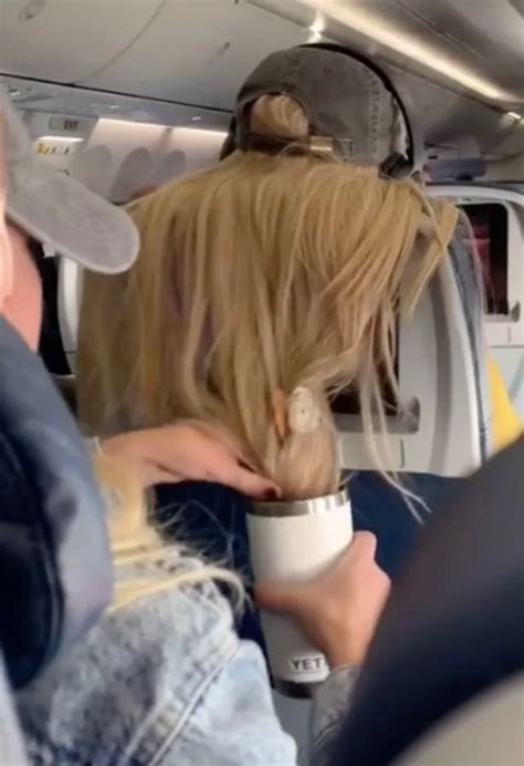 Angry Plane Passenger Sticks Gum In Womans Hair Because She Was Blocking Her Tv