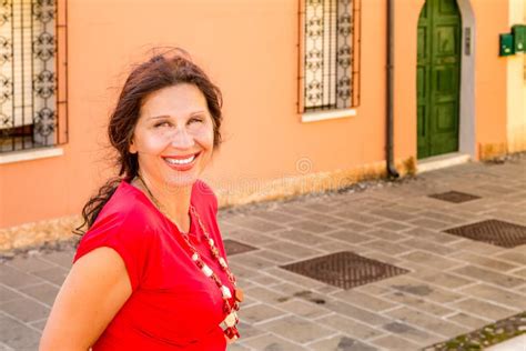 Mature Woman In Typical Town In Italy Stock Image Image Of Spots