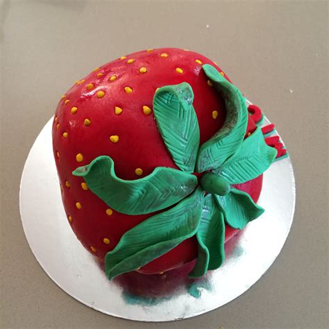 Are you looking for santa themed food ideas? Strawberry shaped cake (With images) | Christmas ornaments, Holiday decor, Cake decorating
