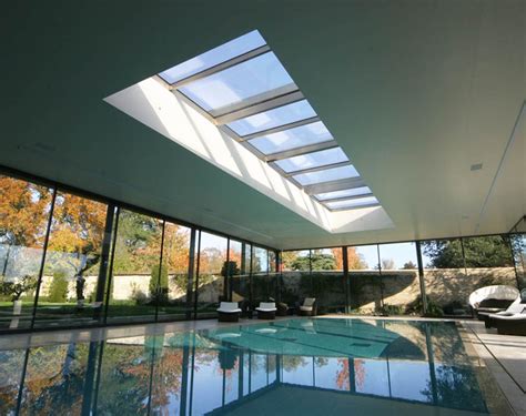 An Elegantly Long Opening Roof Offering An Open Air Swimming