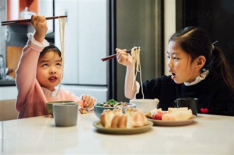 Cute Girls Eating At Home By Stocksy Contributor Maahoo Stocksy