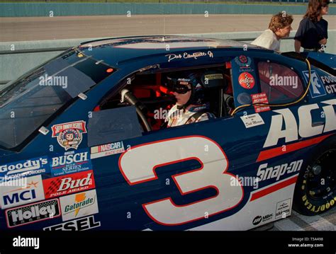 Dale Earnhardt Jr Sits In His Car At Homestead Miami Speedway In