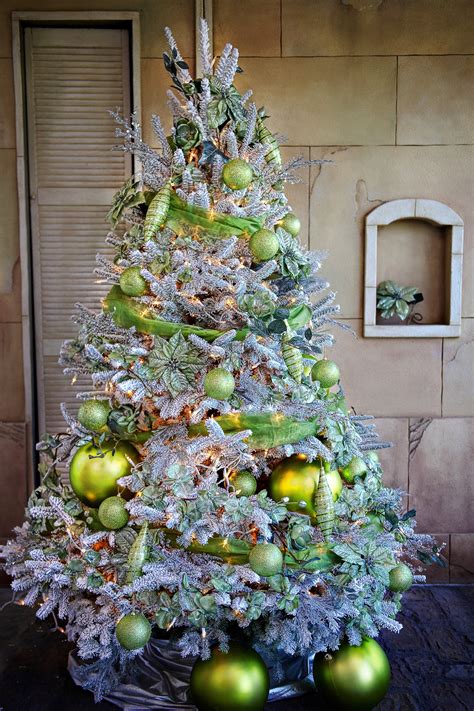 Flocked Tree with Lime Green Ornaments.  Holiday christmas tree