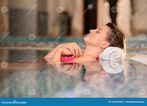 beautiful woman wearing swimsuits relaxing in swimming pool stock image image of bath bubbles
