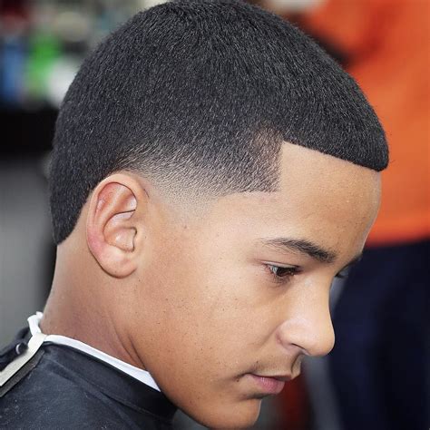 The whole of the head is shaved off in a masculine style, while there is. Black men haircuts styles in barber shop - Haircuts for ...