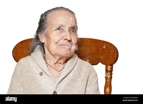 Portrait Of Gray Haired Elderly Woman Grandmother Sitting On Vintage
