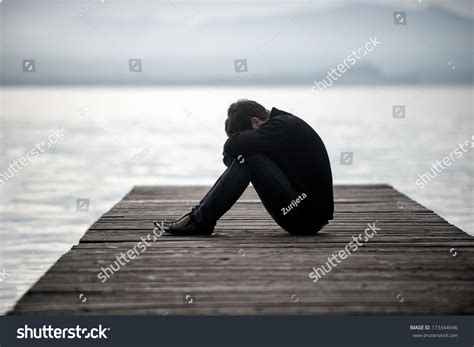 Lonely Sad Man Sitting On Dock Stock Photo 173344946 Shutterstock
