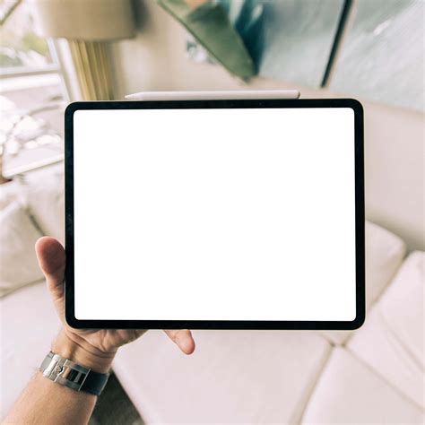 Free Tablet In Hand Mockup Psd