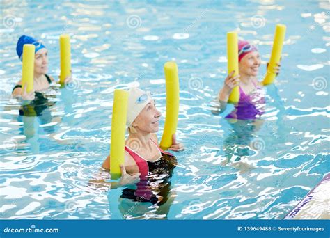 Mature Women Working Out In Water Stock Photo Image Of Retired Adult