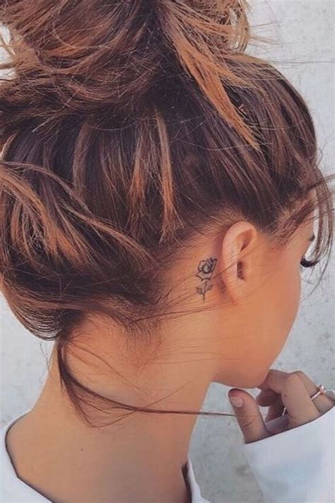 If you love tattoos, this is a great idea to add some fun and unique ink to your collection! flower tattoo behind ear #flowertattoos | Behind ear ...