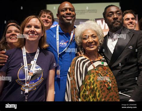Former NASA astronaut Leland Melvin, center, actress Nichelle Nichols