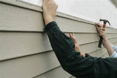 Here are 7 steps to replacing vinyl siding panels yourself. Vinyl Siding Installation & Repair Contractor northern VA, Md, DC