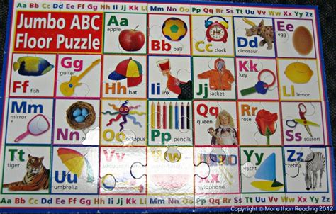 The floor is a great place to do an alphabet puzzle | Alphabet puzzles