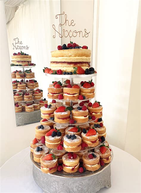 Naked Wedding Cake With Tower Of Mini Naked Cakes The Cakery