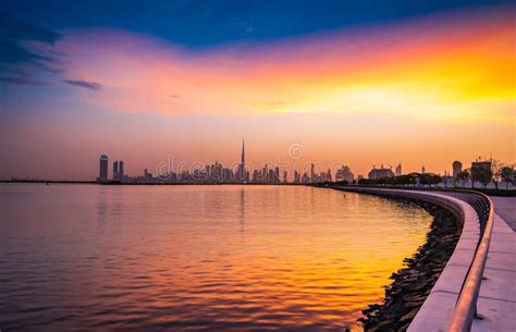 Stunning View Of Dubai City Skyline At Sunset With A Colorful Sky And