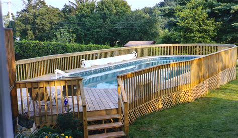 Depending on if you're integrating your above ground pool with an existing deck, or if you're planning on building a deck to wrap around your above ground pool, the price can fluctuate anywhere from $700 to over $10,000. Oval Above Ground Pool With Deck | Pool Design Ideas