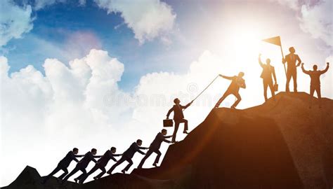 Concept Of Teamwork With Team Climbing Mountain Top Stock Image Image