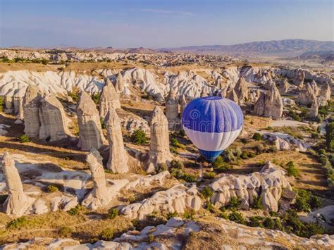 Colorful Hot Air Balloons Flying Over At Fairy Chimneys Valley In